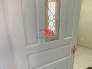 Pintura de portas na Vila Medeiros